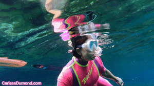 xsiteability.com - Carissa in the pink wet suit in the spring thumbnail